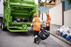expert witness used this image of a garbage truck with men loading garbage into it for evaluation