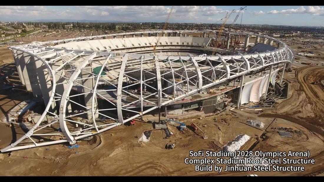 Complex structural steel roof lattice of SoFi Stadium demonstrating tension and compression members